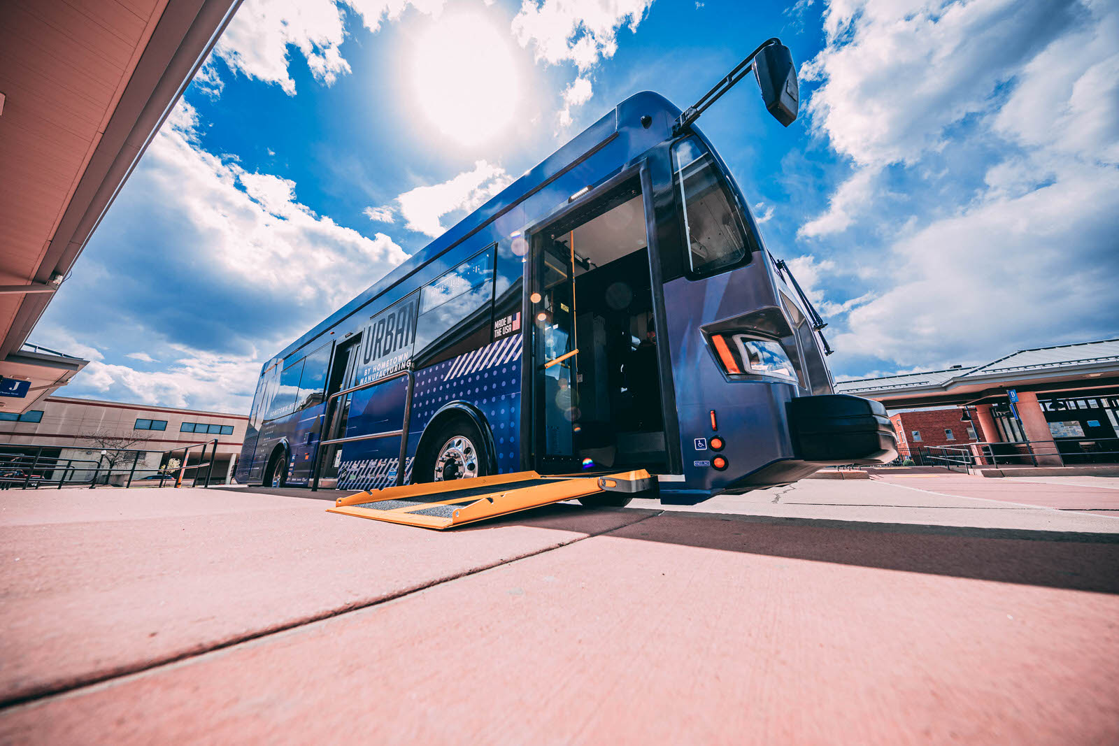 Paratransit: accessible low-floor bus with deployed ramp