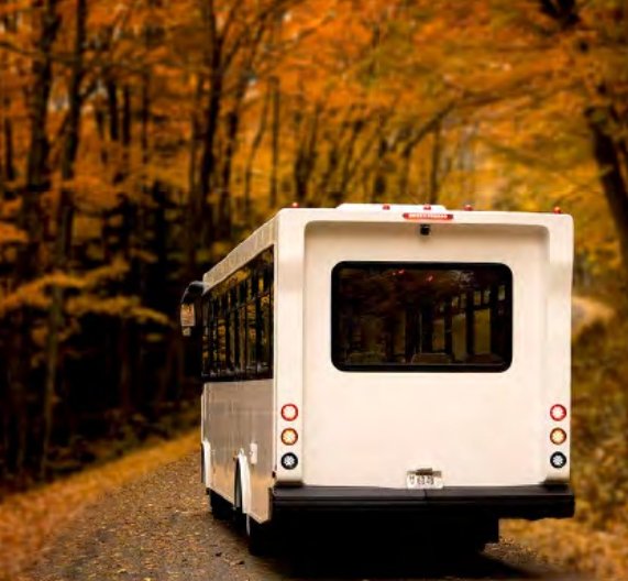 Hometown Coach View on a scenic autumn road